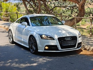 TT